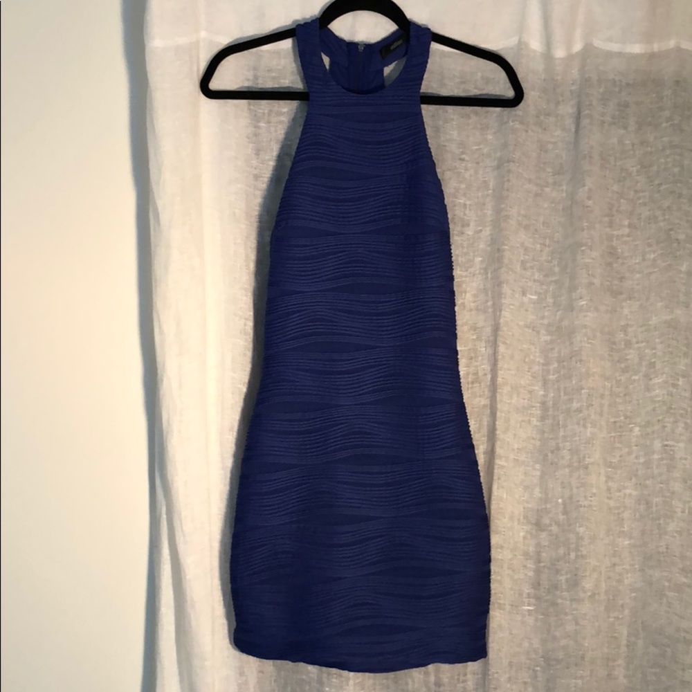 Blue body con mini dress with ribbed texture.